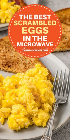 the best scrambled eggs in the microwave on a white plate with silverware and toast