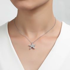 Fun and stylish. This starfish necklace is set with 1.01 carats total weight of Lafonn's signature Lassaire simulated diamonds in sterling silver bonded with platinum. The pendant comes on an adjustable 20" chain. Pendant measures approximately 0.75 inches from top to bottom and just over a 0.75 inches wide at widest point Includes pendant box Ships fully insured to point of delivery Luxury Starfish-shaped Jewelry Gift, Elegant Starfish Charm Jewelry For Gifts, Elegant Starfish Charm Jewelry As Gift, Elegant Starfish Charm Jewelry Gift, Elegant Star-shaped Jewelry With Starfish Charm, Elegant Jewelry With Starfish Charm, Elegant Starfish Necklace For Gift, Elegant Starfish Charm Pendant Jewelry, Elegant Starfish Charm Jewelry For Anniversary