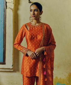 The rust printed, hand-embroidered kurta in dupion silk paired with printed flared pants and a tasseled dupatta sounds like a striking ensemble. The hand embroidery adds intricate detailing to the kurta, while the printed pants and dupatta complement the overall look with their coordinated design. Flared Sharara, Kurta And Palazzo, Clover Print, Kurta Sharara Set, Kurta Sharara, Printed Dupatta, Palazzo Set, Dupion Silk, Luxury Sale