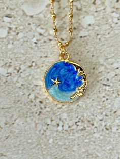 Celestial pendant features a blue and turquoise enamel gold plated moon and stars pendant measuring 22 x 24mm accented with a gold pyrite rosary chain and lobster claw clasp. GIFT BOXED Celestial Pendant, Nose Contouring, Necklace Moon, Celestial Necklace, Rosary Chain, Handcrafted Artisan Jewelry, Makeup For Beginners, Contour Makeup, Moon And Stars