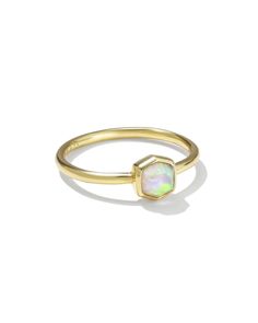 You can’t go wrong with the Davie 18k Gold Vermeil Band Ring in White Kyocera Opal. Our signature icon reimagined in a modern, minimalist design made to wear every day. Metal 18k Yellow Gold Vermeil What is Vermeil? Vermeil (that’s pronounced ver-may) is a gold plating technique that dates back to the 19th century. While other jewelers plate over less durable metals, our vermeil starts with a Sterling Silver base and is plated with just over 2.5 microns of 18k Gold to create a more timeless piec 14k Yellow Gold Opal Ring With Halo, Modern Yellow Gold Opal Ring Gift, Modern 14k Gold Opal Gemstone Ring, Modern Gold Stackable Gemstone Rings, Modern Stackable Gold Rings With Gemstones, Modern Gold Stackable Rings With Gemstones, Modern Opal Ring In 14k Gold With Polished Finish, Modern 14k Gold Opal Ring With Polished Finish, Yellow Gold Polished Opal Ring