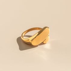 DESCRIPTION & DETAILS This gold ring is stylish, beautiful, and chic. The split design makes this solid style ring can complete any outfit. You can wear it alone or stack it with other rings to show your charm, and you can style a variety of outfits suitable for all occasions. Plating: 14k Gold Materials: 14k Gold on Stainless Steel Measurements: 45+5cm，2*1.3cm Hypoallergenic SUSTAINABILITY In-house plating - All pieces are handcrafted by our in-house jewelers ensuring a high standard of working Modern Gold Stackable Initial Ring, Trendy Gold Open Ring With Initial, Trendy Gold Open Initial Ring, Trendy Gold Initial Open Ring, Adjustable Gold Modern Signet Ring, Trendy Gold Stackable Rings For Wedding, Minimalist 14k Gold-tone Ring, Modern Adjustable Gold Signet Ring, Modern Yellow Gold Midi Rings