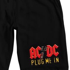 Unleash the rock 'n' roll energy even in your dreams with these officially licensed ACDC sleep pajama shorts. Their distinctive custom design, featuring the iconic ACDC logo and "Plug Me In" in bold yellow letters, sets them apart as a must-have for dedicated fans. Expertly crafted from cozy French terry fabric, these shorts offer unparalleled comfort and style. The drawstring adjustable elastic waistband ensures a personalized fit for your utmost comfort. To keep them in pristine condition, sim Black Cotton Shorts With Logo Print, Cotton Shorts With Logo Print, Streetwear Cotton Shorts With Logo Print, Casual Logo Print Shorts For Streetwear, Casual Streetwear Shorts With Logo Print, Graphic Print Cotton Shorts For Leisure, Acdc Logo, Yellow Letters, Jockey Mens