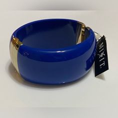 Bold Blue With Gold Accents Bangle Spring Party Blue Bracelets, Adjustable Blue Cuff Bracelet For Party, Elegant Blue Bracelets For Spring, Blue Bangle Cuff Bracelet For Party, Blue Cuff Bracelet Bangle For Formal Occasions, Blue Bangle Cuff Bracelet For Formal Occasions, Formal Blue Bangle Cuff Bracelet, Trendy Adjustable Blue Cuff Bracelet, Trendy Blue Formal Jewelry