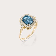 The Katerina ring is our show-stopping piece and has a large 1.8CT Blue Topaz London stone in the center. Adorning the stone are 28 sparkling diamonds creating a halo effect around the stone. It’s a ring inspired by royalty and it's absolutely glamorous. **Due to the nature of the stone the color of the center stone may vary** All features can be customized! please contact us if you wish to make changes, we love making custom designs. All of our jewelry is carefully handmade in our atelier *HC diamond are all conflict free diamonds To order by phone click here>> +972(0)722991000 Elegant Topaz Halo Ring, Fine Jewelry Blue Topaz Ring With Halo Design, Blue Topaz Ring With Halo Design, Baguette Cut Topaz Ring With Diamond Halo Setting, Blue Topaz Halo Ring For Wedding, Baguette Cut Topaz Ring With Diamond Halo, Formal Blue Topaz Diamond Ring With Halo Design, Luxury Diamond Topaz Ring With Halo Design, Classic Topaz Ring With Diamond Halo Design