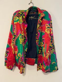 "Vintage Saks Fifth Avenue Peter Nygard Silk Jacket Size 6 Color-block Ladies Formal Attire Multi-color Long Sleeve Button Casual Jacket Oversized Vintage Peter Nygard 100% Silk Jacket With Gold Buttons. It Has Shoulder Pads And Still Has The Extra Button Included.  Condition:  In Excellent Used Condition! Beautiful Colors And Sophisticated Style! Measurements:   Ladies size:  6. (Runs big and can fit a person size 18)   Shoulder to shoulder:  19\"   Chest:  48\"   Inseam Sleeve Length:  19\" 90s Multicolor Streetwear Outerwear, Retro Multicolor Windbreaker For Fall, Vintage Multicolor Windbreaker For Spring, Trendy Multicolor Long Sleeve Windbreaker, Vintage Multicolor Windbreaker For Fall, Multicolor Long Sleeve Color Block Windbreaker, 90s Style Multicolor Patchwork Outerwear, 90s Patchwork Multicolor Outerwear, Retro Multicolor Outerwear For Streetwear