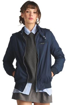 The Women's Classic Iconic Racer Jacket is the ultimate choice for the fashion-forward woman. This sleek and chic jacket boasts a double snap throat latch, shoulder epaulettes, and a front logo pocket that give it a distinctive flair. Also features discreet inside pocket Front Zip closure and two waist pockets Double snap iconic throat latch, signature shoulder epaulettes, and trademark front logo pocket. Imported Polyester/Cotton Perfect for Year-Round Wear. Water Resistance 80's Iconic Jacket Classic Workwear Outerwear With Button Zip Fly, Casual Outerwear With Pockets For Commuting, Modern Outerwear With Snap Buttons, Shoulder Epaulettes, Chic Jacket, Racer Jacket, Members Only, Nordstrom Store, Anniversary Sale