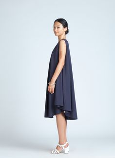 Dark Blue Jade Tent Sleeveless Dress Casual Sleeveless Dress With Relaxed Fit, Chic Blue Dress With Relaxed Skirt, Chic Blue Dresses With Relaxed Skirt, Chic Fluid Sleeveless Dress, Chic Sleeveless Fluid Dress, Chic Sleeveless Dress With Relaxed Skirt, Versatile Sleeveless Midi Dress For Daywear, Versatile Sleeveless Daywear Dress, Tent Silhouette