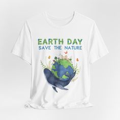 Celebrate Earth Day with our 'Save the Nature' t-shirt design, a homage to environmental stewardship. Wear it proudly as a reminder to protect our planet and preserve its natural beauty for future generations. This classic unisex jersey short sleeve tee fits like a well-loved favorite. Soft cotton and quality print make users fall in love with it over and over again. These t-shirts have-ribbed knit collars to bolster shaping. The shoulders are tapered for a better fit over time. Dual side seams Earth Day Graphic Tee With Letter Print, Eco-friendly Graphic Tee With Crew Neck, Eco-friendly Graphic Tee With Short Sleeves, White Graphic Print T-shirt For Earth Day, Eco-friendly Short Sleeve T-shirt, Eco-friendly Graphic Print T-shirt For Summer, Earth Day Casual Short Sleeve T-shirt, Eco-friendly Short Sleeve Cotton T-shirt, White T-shirt With Earth Day Graphic Print