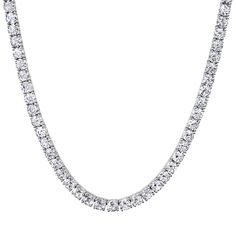 Make a statement on and off the court with this dazzling CZ Tennis Necklace-4MM. It's the perfect way to showcase your love for the game in a subtle but stylish way - it's simple but effective! Who said tennis couldn't be glamorous? Swing away in style! Sterling Silver, cubic zirconia SKU: FSE-26 (SS/CL) 4MM Classic White Cubic Zirconia Tennis Necklace, Elegant Iced Out Tennis Necklace For Anniversary, Classic White Gold Iced Out Necklace, Classic Iced Out Necklace For Formal Occasions, Classic Iced Out White Gold Necklace, White Diamond Tennis Necklace Iced Out, White Diamond Iced Out Tennis Necklace, Iced Out White Diamond Tennis Necklace, Classic Iced Out Jewelry For Wedding