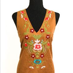 This Bohemian Beauty Is Unique With Its Embroidered Front Panel And Sueded Lightweight Fabric. The Arms Are Sleeveless With A V- Neck. New - Never Worn Item. Available In S-L Sizes. Spring Bohemian Sleeveless Embroidered Dress, Bohemian Sleeveless Embroidered Dress For Spring, Bohemian Embroidered Sleeveless Fitted Dress, Sleeveless Embroidered Dress With Floral Print, Sleeveless Bohemian Embroidered Dress, Fitted Sleeveless Bohemian Embroidered Dress, Sleeveless Fitted Embroidered Dress For Festival, Fitted Sleeveless Embroidered Festival Dress, Fitted Sleeveless Embroidered Dress For Festival