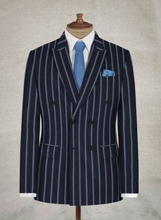 Look sharp and create a long-lasting impression in our Napolean Vanda Navy Blue Wool Suit. Crafted from wool blend, the suit has a deep color and light stripes which will give you a modern look at a casual or a business event. Stay up to date in terms of fashion by getting your hands on our masterpiece. 
 
Look Includes   Napolean Vanda Navy Blue Wool Fabric  Double Breasted Jacket Style  Peak Lapel  Horn Royal Black Buttons  Single Vent  Three Cuff Buttons  Two Welted Back Pockets on Trousers Striped Double Breasted Suit For Semi-formal Occasions, Tailored Striped Suits With Double Button Closure, Striped Double Breasted Suit With Notch Lapel For Office, Fitted Striped Double Breasted Suit With Suit Collar, Striped Double Breasted Suit With Double Button For Semi-formal, Fitted Striped Double Breasted Suit With Double Button Closure, Striped Fitted Double Breasted Suit With Double Button, Striped Semi-formal Suit, Striped Double Breasted Suit With Notch Lapel For Business