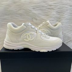 Chanel Interlocking Cc Logo Sneakers Tennis Shoes Size 40.5 In White Brand New In Box, Never Worn, No Flaws! Note: Chanel Sneakers Tend To Run Small. Chanel Interlocking Cc Logo Shoes, Luxury High-top Sneakers With Round Toe For Sports, Luxury High-top Sports Sneakers, Luxury High-top Custom Sneakers With Cushioned Footbed, Luxury Low-top Custom Sneakers With Cushioned Footbed, Luxury Custom High-top Sneakers With Cushioned Footbed, Luxury Custom Low-top Sneakers With Cushioned Footbed, Luxury Custom Sneakers With Boost Midsole, Luxury White High-top Sneakers With Laces