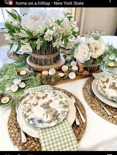 the table is set with dishes and place settings