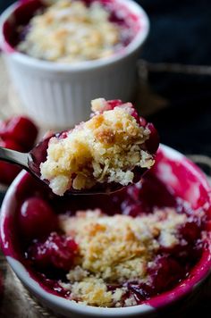 a spoonful of cranberry cobbler on top of a bowl