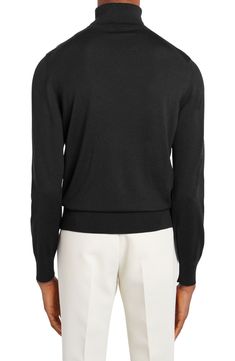 Treat yourself to the luxurious look and feel of this Italian-crafted turtleneck sweater made from warm merino wool. 24 1/2" length (size 48) Turtleneck Long sleeves 100% wool Dry clean Made in Italy Men's Designer Clothing Elegant Black Fine Knit V-neck Sweater, Elegant Black Sweater With Ribbed Cuffs, High Neck Wool Sweater For Work, Elegant Black V-neck Sweater For Work, Elegant Merino Wool V-neck Sweater For Fall, Elegant Long Sleeve Merino Wool V-neck Sweater, Elegant Fine Knit Sweater For Business Casual, Luxury Wool Sweater For Work, Wool Turtleneck Polo Sweater