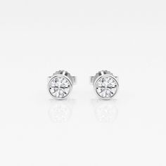 If you can't travel to Europe, then bring these classic European styled studs to you! These earrings have beautiful round lab grown diamonds set in a classic bezel setting. De rien?you're welcome! Diamond White Bezel Set Earrings For Formal Occasions, Diamond White Earrings With Bezel Setting For Formal Occasions, Luxury Bezel Setting Round Cut Earrings, Luxury Round Cut Bezel Set Earrings, Classic Diamond Earrings With Bezel Setting, Timeless White Gold Diamond Earrings With Bezel Setting, Everyday Luxury Classic Diamond Earrings, Classic Everyday Luxury Diamond Earrings, Classic Earrings With Bezel Setting