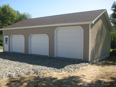 two garages with one car attached to the side and another on the other side