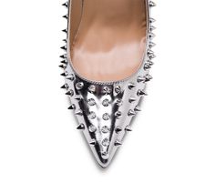 Genuine leather upper and insole; rubber outsole Point toe Spikes all over the shoes Pink sole 4" heel (10 cm, approximately) Silver Pointed Toe Heels With Studs, Silver Heels With Spikes For Formal Occasions, Silver Spiked Heels For Formal Occasions, Silver Heels With Round Toe, Party Heels With Rubber Sole, Party Heels With Rubber Sole And Closed Toe, Party Heels With Rubber Sole, Closed Toe, Closed Toe Party Heels With Rubber Sole, Closed Toe Heels With Rubber Sole For Party