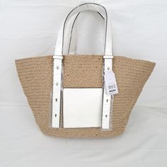 Time And Tru Womens Jute Pocket Tote Bag, Purse, Tan White. Perfect For Summer Vacation & Picnics Features: *Adjustable Double Handles *Spacious Interior *Contrast Slip Pocket Dimension: 15.75 In H 20.5 In W 4. 25 In D 100% Jute With Mammade Accents Wipe Clean Summer Straw Shoulder Bag For Errands, Summer Shoulder Bag With Braided Handles For Errands, Spring White Beach Bag With Large Capacity, Large Capacity White Beach Bag For Spring, Trendy White Straw Tote Bag, White Shoulder Bag For Spring Errands, Summer Straw Bag With Handles For Errands, White Beach Bag With Adjustable Strap For Spring, White Spring Beach Bag With Adjustable Strap