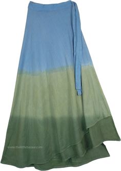 Costa de Sol Wrap Around Beach Skirt - A great skirt for some coolness in the sun; this skirt is an amazing choice to wear to the beach this summer. The skirt`s fabric is dyed in green and blue, the entire fall of the skirt is full with a graceful side wrap. Made of 100% cotton, its long flowy fabric will keep you comfortable, no matter how warm it gets all season long. You can wear this skirt with a plain solid tank top for casual days, and with an embroidered one for an evening party. Pair it Green Cotton Casual Maxi Skirt, Green Flowy Cotton Skirt, Green Flowy Summer Skirt, Green Cotton Maxi Skirt With Relaxed Fit, Flowy Green Skirt For Summer, Spring Beachwear Long Skirt, Green Maxi Skirt For Beach Vacation, Spring Green Cotton Skirt, Long Beachwear Skirt For Spring