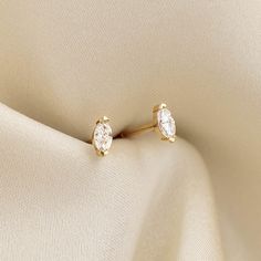 Marquise-cut diamond stud earrings, set in 14k yellow gold—classic and elegant! 


Marquise-cut diamonds measure 4mm x 2mm 

0.16 total carat weight

Butterfly back closure Classic Marquise Diamond Earrings For Formal, Classic Marquise Diamond Earrings For Formal Occasions, Classic Marquise Cut White Gold Diamond Earrings, Classic White Gold Marquise Cut Diamond Earrings, Classic Marquise Diamond Cut Earrings, Classic Marquise Diamond White Earrings, Brilliant Cut Marquise Diamond Earrings For Anniversary, Anniversary Diamond Earrings Marquise Brilliant Cut, Classic Marquise-cut Diamond Earrings