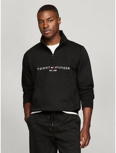 Tommy Hilfiger men's sweatshirt. Our seriously soft mockneck sweatshirt is made from brushed-back fleece with a flat, clean face and smooth feel. Complete with a quarter-zip placket, rib-knit cuffs and hem, and our embroidered Tommy logo at the chest.  Material: 69% Regenerative Cotton, 31% Polyester Pes. Tommy Hilfiger Quarter Zip, Tommy Hilfiger Crew Neck Sweatshirt For Streetwear, Tommy Hilfiger Cotton Logo Print Sweatshirt, Tommy Hilfiger Logo Print Long Sleeve Sweatshirt, Tommy Hilfiger Graphic Print Crew Neck T-shirt, Clean Face, Tommy Hilfiger Man, Knit Cuff, Quarter Zip