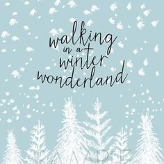 the words walking in winter wonderland written on a blue background with white snowflakes