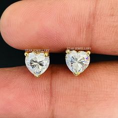 "ITEM SPECIFICATION 2.50 Ct CVD Heart Diamond Solitaire Stud Earring for her, Prong Set Solid Gold Unisex 2.50 Ct Heart Lab Grown Diamond Stud Earring, Unisex Heart Diamond Studs PRODUCT DETAILS Diamond Shape : Round Cut Lab Grown Diamond (CVD or HPHT ) Diamond Pcs. : 1 Diamond Carat : 1.25 Ct (7 MM) Diamond Clarity : VVS - VS Diamond Color : E F Setting Type : Prong  Metal Customization: Yellow Solid Gold - White Solid Gold - Rose Solid Gold (10K-14K-18K) Metal Purity - 14K Style - Mention deta Solitaire Studs, Heart Diamond, Vs Diamond, Star Jewelry, Diamond Stud, Diamond Bracelets, Diamond Heart, Stud Earring, Diamond Earrings Studs