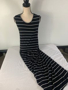 Merona Dress Size Small Color: black and White Material: feels like rayon and spandex, super soft and stretchy Missing belt bag 22e JN Casual Fitted Elastane Maxi Dress, Casual Elastane Maxi Dress For Summer, Casual Stretch Maxi Dress, Casual Maxi Length Dress, Fitted Black Versatile Maxi Dress, Black Fitted Versatile Maxi Dress, Fitted Black Maxi Dress Versatile Style, Casual Fitted Black Maxi Dress, Fitted Black Casual Maxi Dress