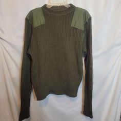 "Wool Marines Sweater Green Vintage Uniform Issued Pullover Size 40 Approx Sm / Med Shoulders 20\" Pit to pit 23\" length 24\" sleeves 28\" preowned from an estate pet friendly home HAS NOT BEEN CLEANED, DRY CLEANED ONLY" Fitted Green Long Sleeve Sweatshirt, Green Military Crew Neck Top, Military Style Long Sleeve Tops For Fall, Vintage Long Sleeve Stretch Sweater, Military Style Green Winter Tops, Winter Military Long Sleeve Tops, Winter Military Style Long Sleeve Tops, Military Style Green Tops For Fall, Fall Military Green Tops