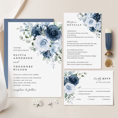 wedding stationery with blue flowers and greenery