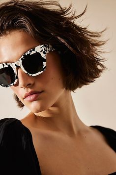 Make a statement in these gorgeous cat-eye sunnies featuring a bold marbled frame with polarized lenses. | Decker Cat Eye Polarized Sunglasses by Free People in Black Trendy Eye Glasses, Black And White Sunglasses, Cat Eye Sunnies, Summer Shades, White Sunglasses, Gorgeous Cats, Sunglasses Polarized, Beach Sunglasses, Cookies And Cream