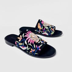 Experience luxury and style with our Rose black embroidered suede leather mule sandal. Made from high-quality suede leather, these mules feature intricate multicolor flower embroidery for a unique and elegant look. Slip into these mules for a comfortable and chic addition to your wardrobe. Features: Flower embroidery for floral look Cushioned footbed with suede leather covering Day to day wear Composition: Upper - 100% Leather Lining - 100% Leather Sock - 100% Leather Outsole - 100% Rubber Embellished Open Toe Mules For Summer, Embellished Open Toe Mules For Spring, Spring Embellished Open Toe Mules, Party Sandals With Floral Embroidery And Open Toe, Leather Socks, Rose Black, Mule Sandals, Leather Mules, Flower Embroidery