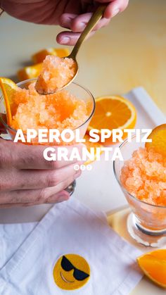 a person spooning oranges into a glass with sugar in it and the words aperoli spritz granita above them