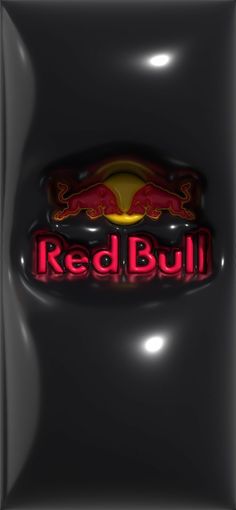 the red bull logo is lit up on a black background