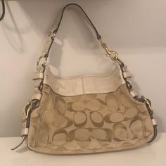 Beige Coach Purse Zipper Gold Metal Details Never Used! Amazing Condition Chic Beige Bags With Brass Hardware, Chic Cream Coach Hobo Bag, Chic Coach Beige Hobo Bag, Chic Beige Coach Hobo Bag, Elegant Coach Beige Hobo Bag, Elegant Beige Coach Hobo Bag, Coach Leather Bag, Grey Shoulder Bag, Coach Satchel