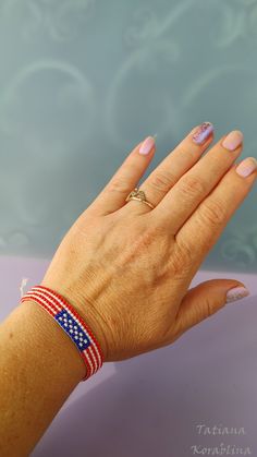 This festival handmade bracelet are made of high-quality Czech beads.  It is elegant, fashionable, and highly versatile, suitable for  Independence Day  and everyday wear. Color: red,white, blue (USA Flag Color )  100% hand made with love! Measurements: Length  - min near 17.5 cm( 6.9 inch ),Width - 1.3cm (0.5 inch) Materials: Czech glass beads Patriotic Bracelet, Flag Bracelet, Seed Bead Bracelet, Flag Colors, Seed Bead Bracelets, Czech Beads, Blue Bracelet, Czech Glass Beads, Usa Flag