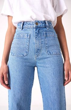 Fall for the silhouette of these high-waist jeans made from stretch-kissed denim in a light-blue wash with retro patch pockets and wide ankle-grazing hems. 28" inseam; 23" leg opening; 12 1/2" front rise; 14 1/2" back rise (size 29) Zip fly with button closure Five-pocket style 99% cotton, 1% elastane Machine wash, line dry Imported Lily Blue, Sailor Jean, Sailor Fashion, Trend Fashion, Denim Design, Looks Style, Mode Inspiration, Mode Outfits, High Waist Jeans