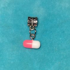 Pill Capsule Nurse Charm Available In Hot Pink, Blue Or Red (Hot Pink Is Pictured) Fits On Pandora Charm Bracelets And Other Same-Size Charm Bracelets (Not From Ht, Listed For Exposure Tags: Essential Workers, Hospital, Medical, Healthcare, Health, Medical, Dr, Doctor, Phd, Nurse, Rn, Pct, Cna, Emt, Physicians Assistant, Pa, Dentist, Pharmacy, Pharmacist, Med Student, Edgy, Halloween, Kawaii, Rave, Retro, Vintage, Costume Party, Cosplay, Emo, 90s, Alice In Wonderland, Goth, Neon, Medicine Physicians Assistant, Emo 90s, Pill Capsule, Music Bracelet, Pastel Bracelet, Pride Bracelet, Mermaid Bracelet, Moon Bracelet, Resin Bangles