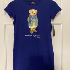 Polo Bear Ralph Lauren Dress Nwt Girls Sz Medium 8-10 Knee Length Dress For Child So Adorable And My Daughter Wouldn’t Wear It. Blue Fitted Dress For Sleepover, Girls Sweatshirt Dress, Polo Bear Ralph Lauren, 60 Dress, Girl Red Dress, Cotton Jersey Dress, Pink And White Dress, Chambray Shirt Dress, Peter Pan Collar Dress