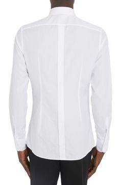 Channel a trim, tailored aesthetic in this cotton button-up shirt that features a crisp point collar and long sleeves. 30 1/2" length (size 40) Front button closure Point collar Long sleeves with button cuffs 100% cotton Dry clean or machine wash, line dry Made in Italy Men's Designer Clothing Designer Slim Fit Dress Shirt For Semi-formal Occasions, Designer Slim Fit Dress Shirt For Formal Occasions, Designer Cotton Dress Shirt For Business, Designer Cotton Dress Shirt For Office, Designer Business Shirt With Spread Collar, Designer Business Shirt With Fold Down Collar, Fitted Luxury Cotton Shirt, Designer Semi-formal Dress Shirt With Spread Collar, Designer Semi-formal Collared Dress Shirt