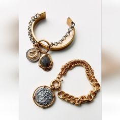 New With Tag Zara 2024 Collection Pack Of Two Bracelets: -Rigid Bracelet With Textured Coin Pendant And Metallic Pieces. -Metal Link Bracelet With Textured Coin Appliqu. Lobster Clasp Closure. Gold / Silver | 1856/217 Outer Shell 53% Zinc 43% Steel 2% Resin 2% Brass Which Has At Least Outer Shell 53% Rcs Certified Recycled Zinc Gold Coin Jewelry, Zara Jewelry, Zara Gold, Coin Bracelet, Coin Jewelry, Coin Pendant, Gold Coins, 2024 Collection, Womens Jewelry Bracelets