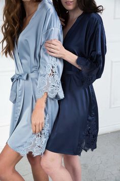 "This lace-trimmed robe is the perfect satin robe for your \"I Do Crew.\" Wear these bridal party robes and have amazing photos for your wedding album! You and your whole wedding party will be sure to enjoy the best in satin bridal robes with these lace-trimmed robes. Peek your way into a fantastic satin bridal robe with this Triangle Lace Satin Wedding Party Robe. Featuring peek-a-boo triangle lace accents, this wedding party robe is the perfect bridesmaid robe that is not only a great fit but Elegant Blue Wedding Robe, Robes Satin, Wedding Party Robes, Satin Bridal Robe, Flower Girl Robes, Bridesmaid Pjs, Satin Robes, Custom Robes, Bridesmaid Pyjamas