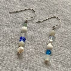 ◻️ millefiori, freshwater pearls and gemstone dangle earrings  ◻️ you will receive 1 pair of earrings and they will come in a gift bag ◻️ these earrings are made from stainless steel meaning your ears will not turn green  ◻️ please select which colour theme you would like from the drop down menu  ◻️ each pair of earrings will differ slightly because they are handmade  ◻️ if you would like a custom pattern please message and we will get back to you as soon as possible Pearl Dangle Earrings With Natural Stones, White Pearl Earrings With Natural Stones, Dangle Earrings With Natural Stones And Czech Glass, White Drop Pearl Earrings With Natural Stones, Pearl Earrings With Natural Stones As A Gift, Everyday White Beaded Earrings, Handmade Everyday Pearl Drop Earrings, White Czech Glass Dangle Jewelry, Everyday Dangle Pearl Earrings