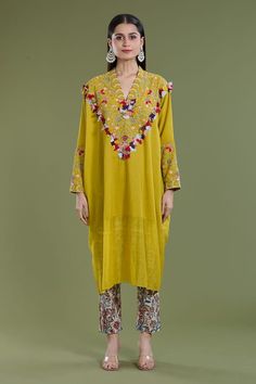 Haldi kaftan with thread, patchwork embroidery in floral pattern. Paired with floral print pant. - Aza Fashions Spring Traditional Kaftan With Dabka Work, Traditional Dabka Work Kaftan For Spring, Bohemian Dabka Work Sets For Spring, Bohemian Straight Kurta Set With Floral Embroidery, Bohemian Set With Straight Kurta And Floral Embroidery, Bohemian Sets With Straight Kurta And Floral Embroidery, Bohemian Sets With Floral Embroidery On Straight Kurta, Bohemian Palazzo Set With Embroidered Border, Spring Anarkali Kaftan With Floral Embroidery