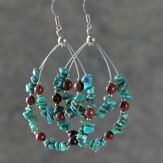 These tear drop loop earrings are handmade using turquoise & brown stones (turquoise & agate). Perfect gift for any occasion! Free U.S shipping! Anni Designs. Turquoise, a refreshing and auspicious color. It is calming but still contains a touch of warmth. It is considered the most healing color. The dimension of the earring is: 2 inches, or 5.0 cm. (excluding the length of hook) For matching necklace, please go to: https://www.etsy.com/listing/130748077/pearl-necklace-crochet-wire-statement For Teardrop Dangle Earrings, Beaded Curtains, Homemade Jewelry, Swarovski Jewelry, Diy Schmuck, Bridesmaid Earrings, Turquoise Earrings, Schmuck Design, Tear Drop