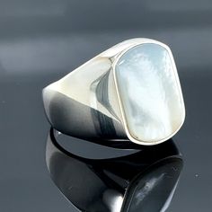 Mother Of Pearl Signet Ring, Men Genuine Pearl Mens Ring, Silver Classic Mother Of Pearl Ring, Ottoman Style Men Ring , 925k Sterling Silver ★Item Details * Gender : Male / Female * Material : 925K Sterling Silver * Total weight :  12 Grams * Gemstone :  Mother Of Pearl  ✔ Ready to Ship in 1-2 Business Days .. ✔ Shipped to the Worldwide 1-5 business days with free shipping... ✔ The product will be sent to you with a handmade wooden box to avoid any damage during shipping... ✔ Visit our store, br Classic Polished Opal Ring For Anniversary, Classic White Opal Ring With Polished Finish, Silver Signet Ring With Polished Edges For Anniversary, Classic Polished Moonstone Ring For Anniversary, Classic Moonstone Ring For Anniversary With Polished Finish, Emerald Stone Rings, Mother Of Pearl Ring, Mystic Topaz Ring, Ottoman Styling