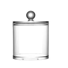 a glass jar with a metal lid and a ball on the top, in front of a white background