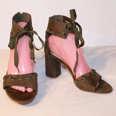 Lane Bryant Sz 9w Dark Olive Gorment Lace Open Toe Back Zipper Ankle Strap Heels Unworn Pre-Owned Condition - Small Tear On Right Footbed From Sticker Removal - See Photos Beautiful Dark Olive Green Faux Suede With Like Color Ribbon Woven Through Grommets On Vamp And Heel - Ribbons Tie To Close Zipper Closure Down Back Of Shoe Open Toe Sandal With 3.5 Inch Wrapped Block Heel Never Worn Very Stylish Statement Shoe Size 9 Wide Green Open Toe Heels With Wooden Heel, Lane Bryant Shoes, Brown Open Toe Lace-up Sandals With Heel Strap, Green Open Toe Lace-up Sandals With Heel Strap, Brown Open Toe T-strap Sandals With Removable Insole, Brown T-strap Sandals With Woven Sole And Open Toe, Statement Shoe, Dark Olive Green, Open Toe Sandals